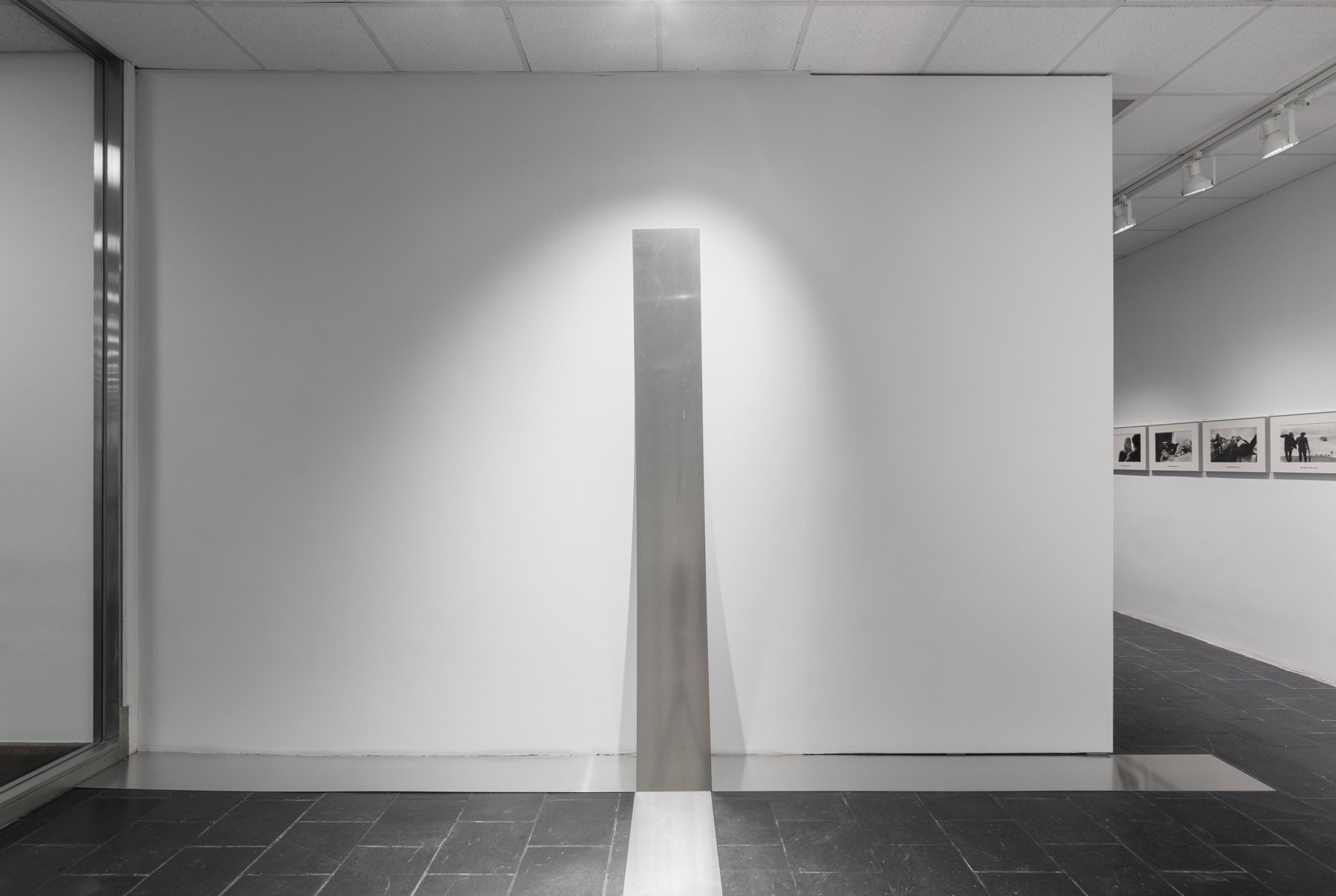   Situación de cuatro placas de aluminio (Four Changeable Plaques),  1966/2014 (Exhibition copy), installed in  Life as Activity: David Lamelas  at Hunter College Art Galleries’ Leubsdorf Gallery, 2021. Four aluminum plates, dimensions variable. Cour