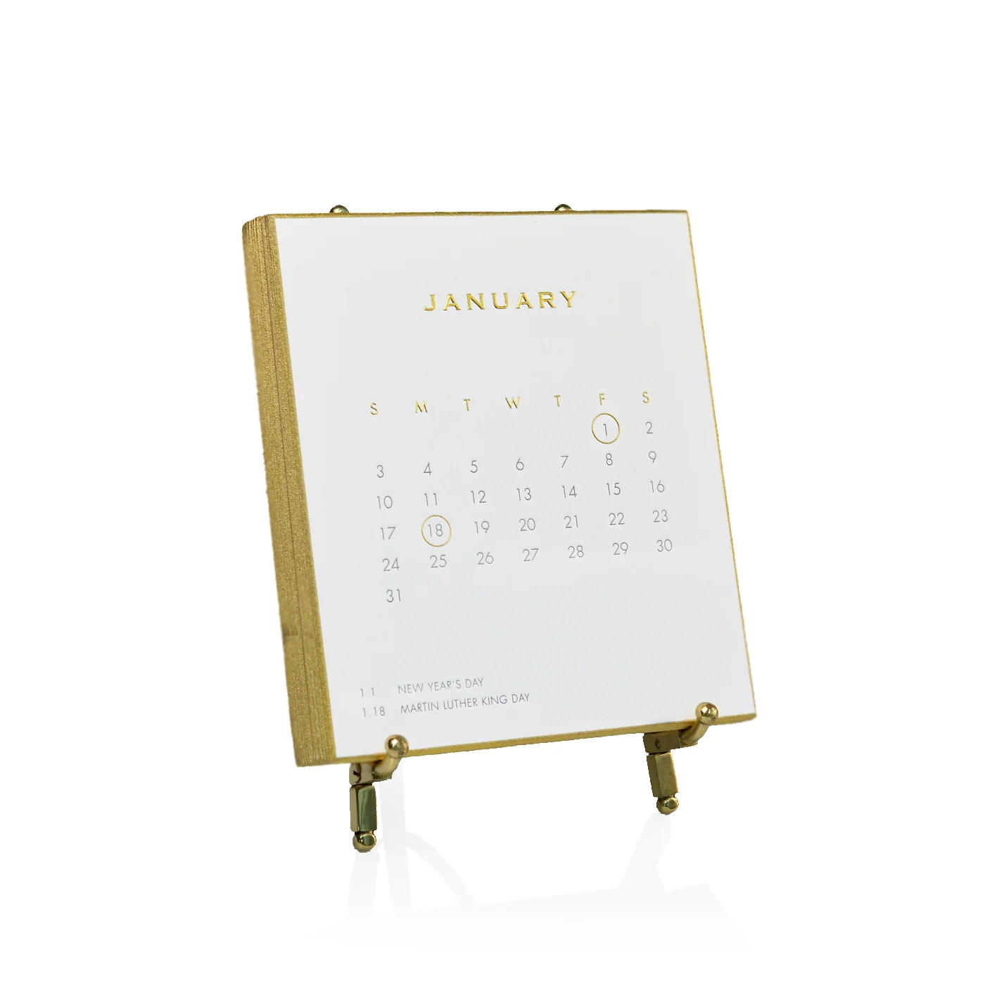 This beautiful calendar is available at Bespoke Designs in Westport. It is made with 2 color letterpress, high quality 2-ply European cotton paper. The beveled edges are hand painted with gold. It comes with a simple gold stand. $145