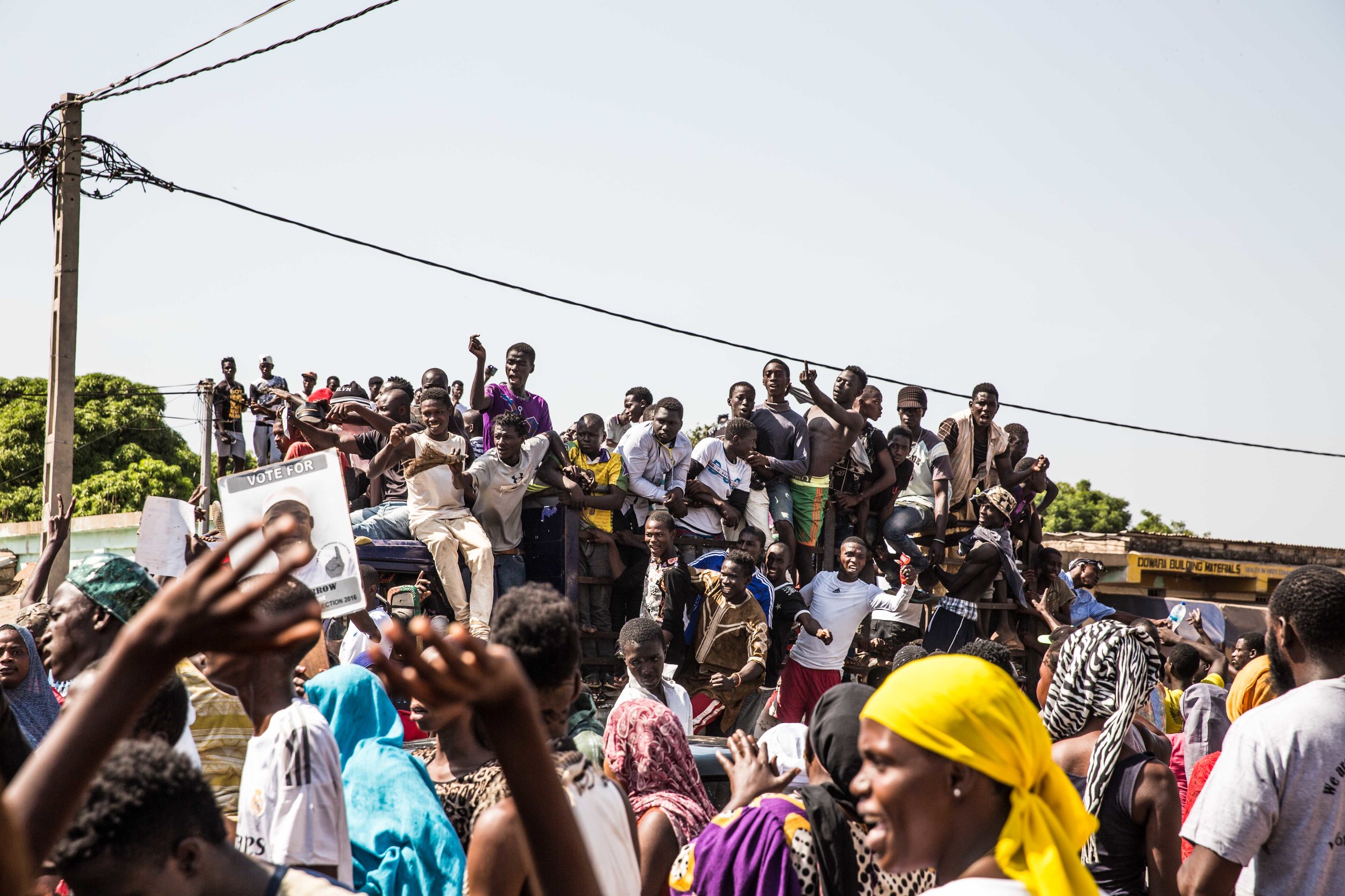 Gambians line the streets to celebrate the victory of their new president Barrow 