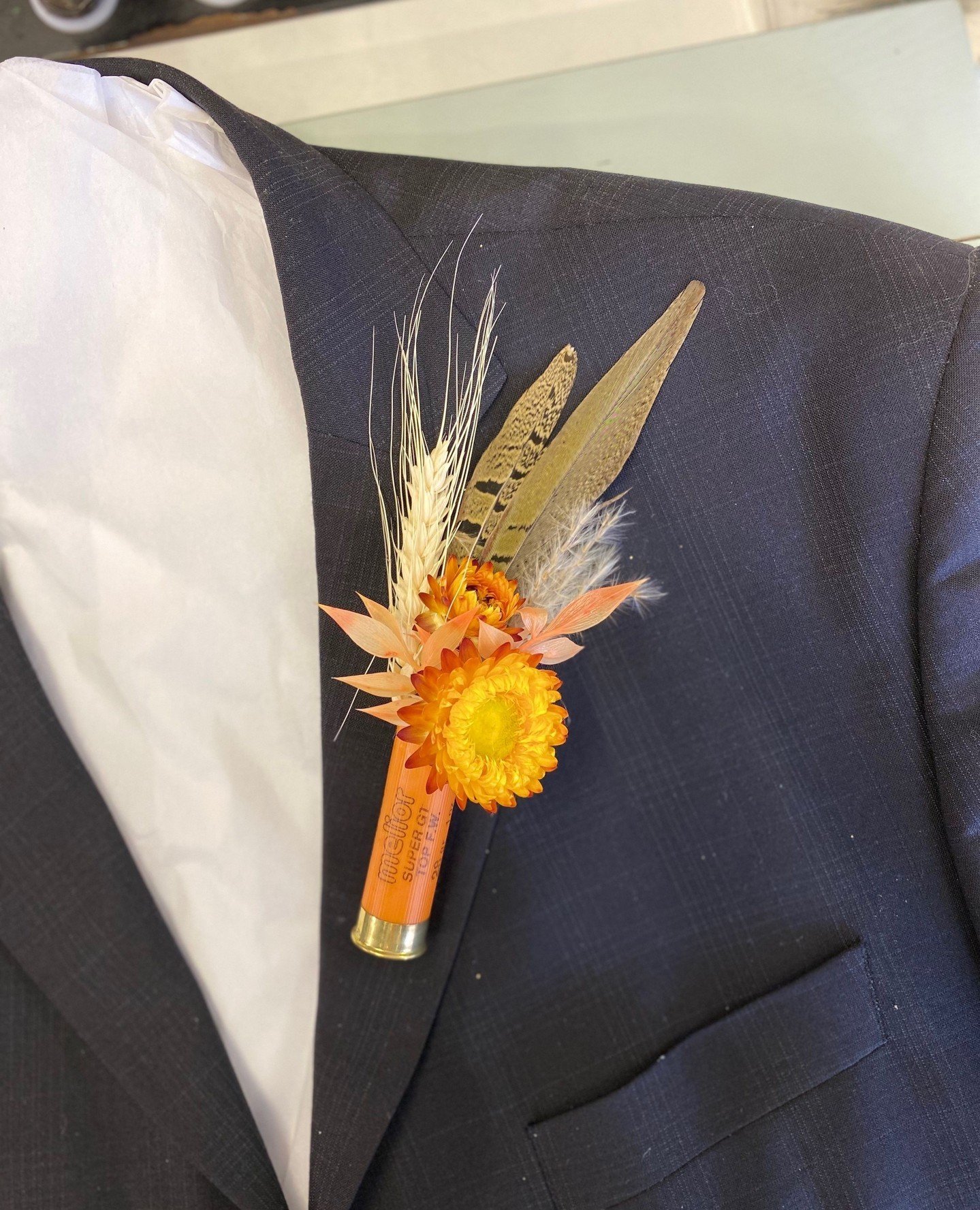 Dapper gents, listen up! Elevate your look with our stylish buttonholes for any special occasion. From classic roses to modern succulents, we have the perfect accessory to complete your ensemble. Stand out from the crowd and add a touch of sophistica