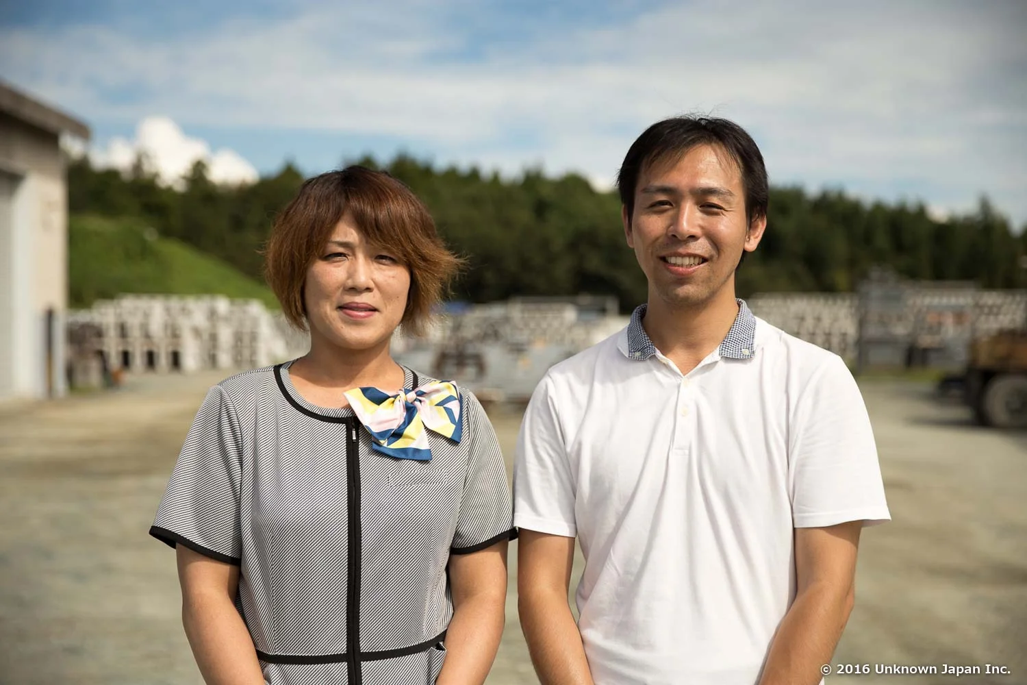With a staff member Haruyo Matsushima in front of the office