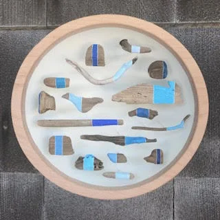 Jane Parkes Blue Harvest , 2019 found driftwood and paint assembled in a wooden bowl 10 in. diameter