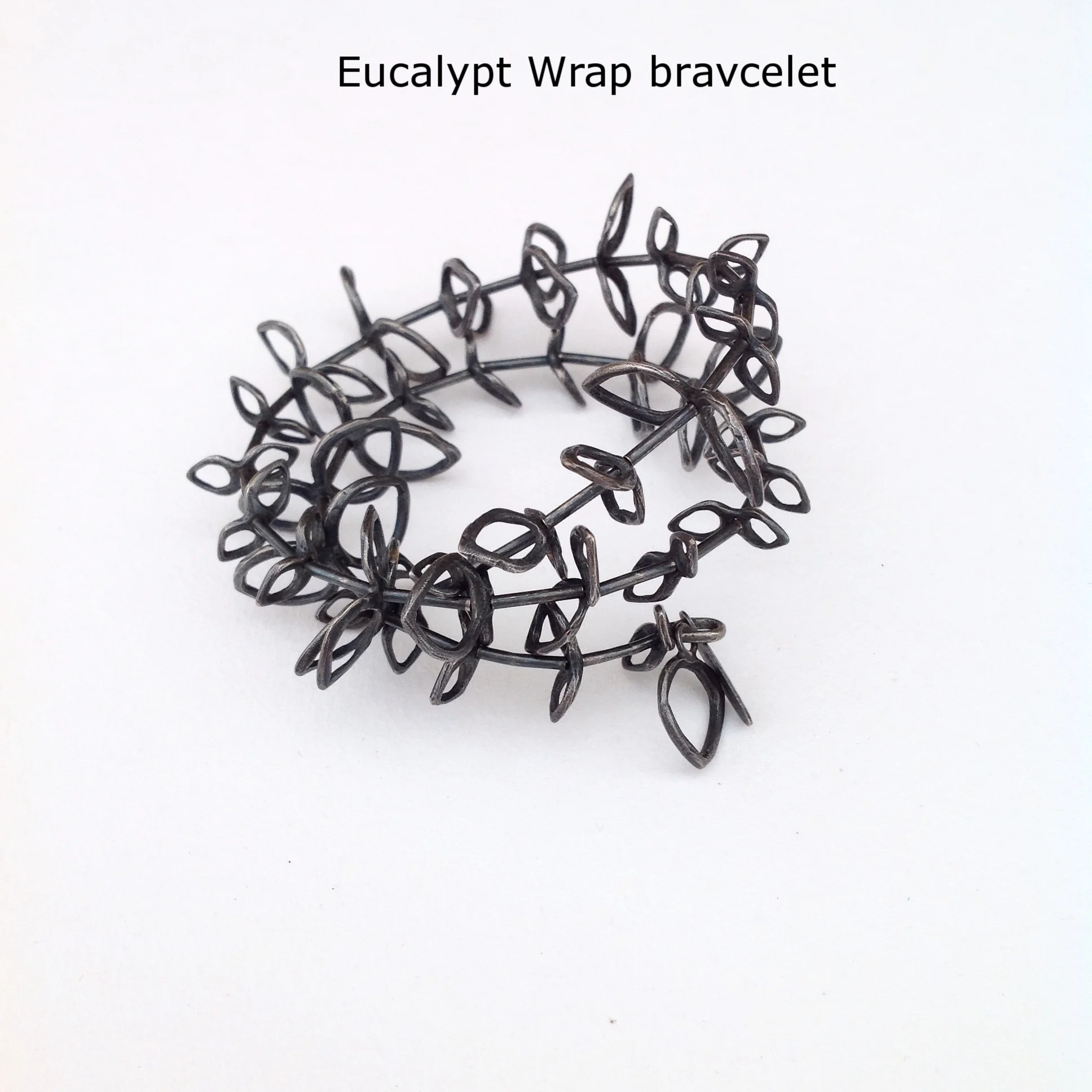 Oxidized sterling with memory wire, Eucalypt inspired bracelet adjustable size by Valerie Mitchell. 