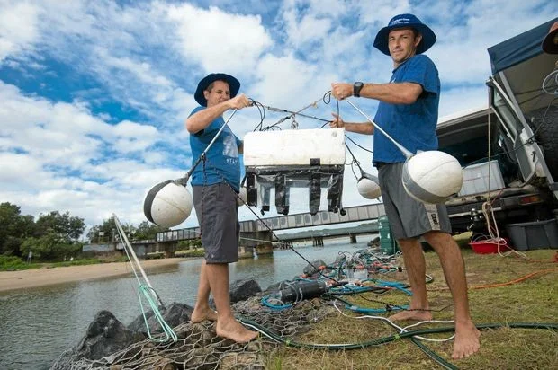 Dr Douglas Tait Research scientist with SCU national marine science centre and PHD candidate Luke Jeffery with some of their water testing equipment at Coffs Creek.