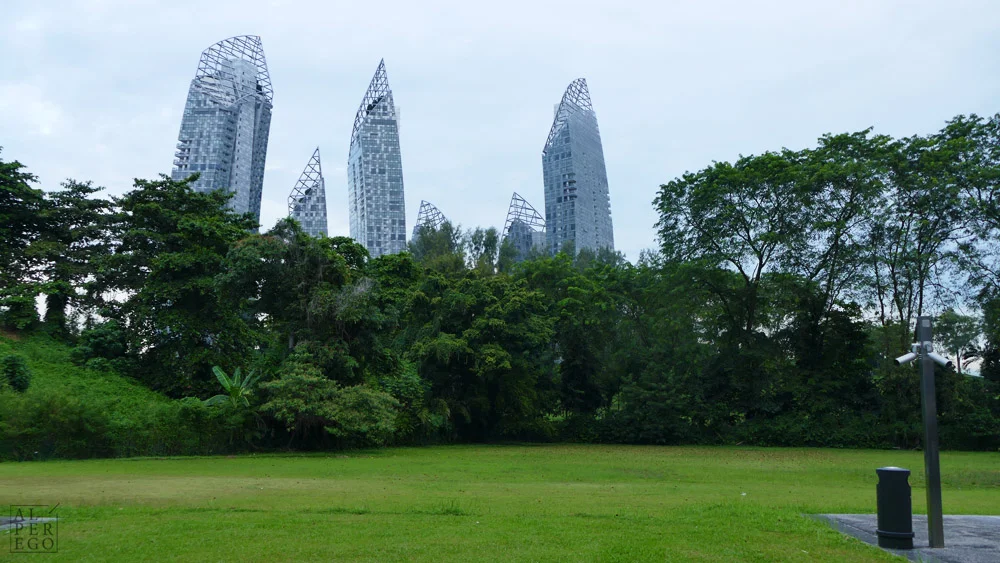 There is a huge golf course between the towers and the subway station.