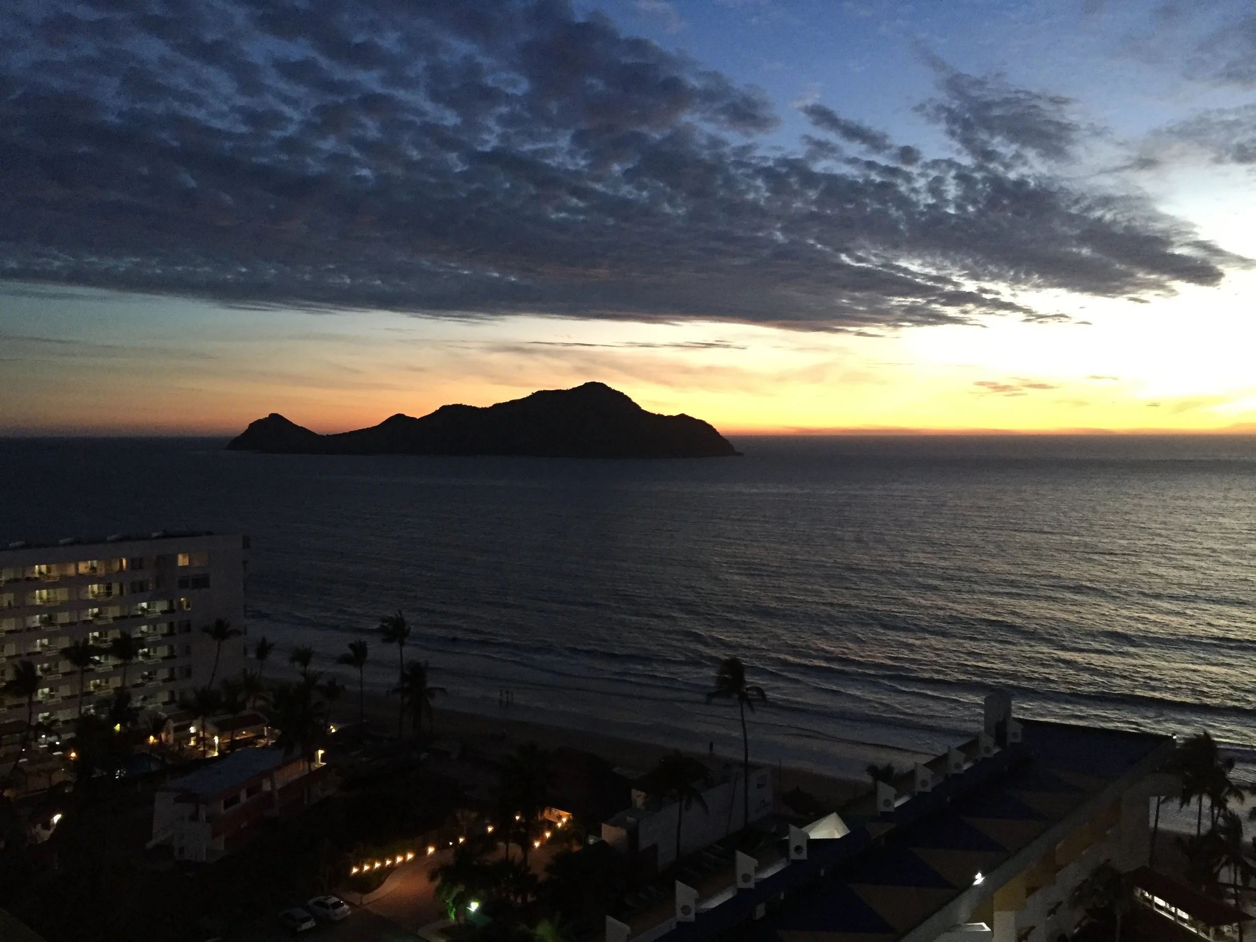 Sunset, looking out from one of the fabulous rooms of the El Cid Castilla Beach resort.