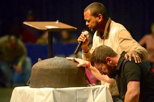 Will Ford and Matt Lockett with the family prayer kettle (Photo: Courtesy of Will Ford)