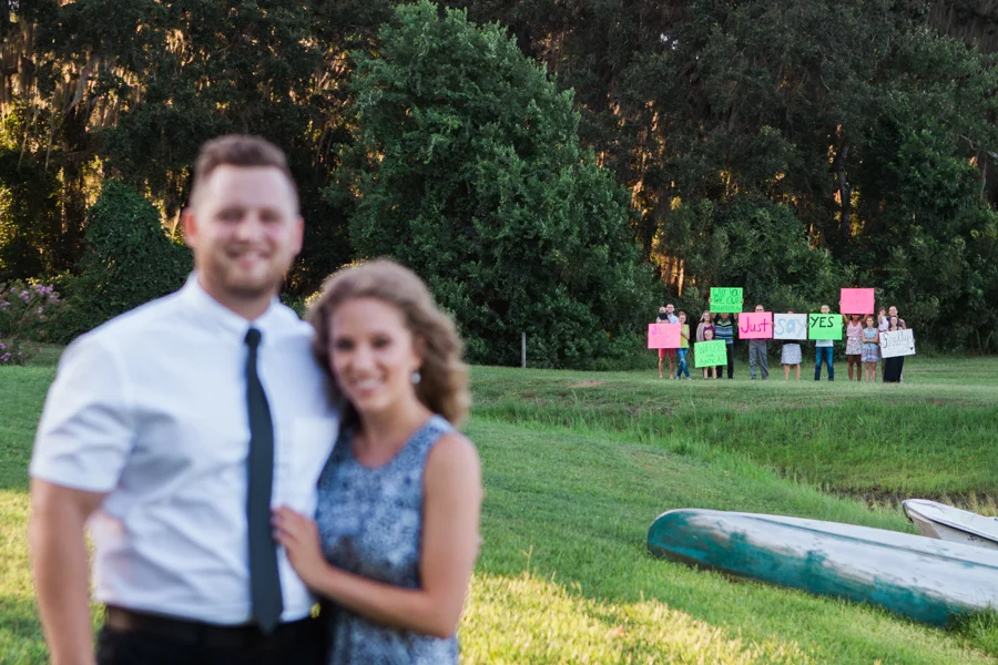 I walked up to Amber and showed her this picture. She was confused for a second wondering what kind of weird people would be at our photo shoot until she saw the words on the signs!