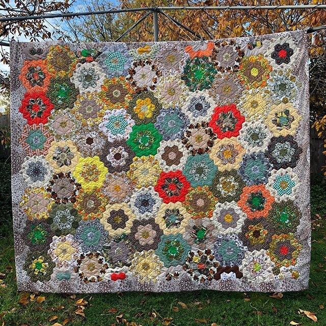 Finished my #ladyproject which was started in the 60s? 70s? by Lucy Besant, a neighbour of a former colleague whose mother became the custodian of the quilt when Lucy died. 
#patchworkquilt #patchwork #hexagonsrule #grandmothersflowergarden #vintagef