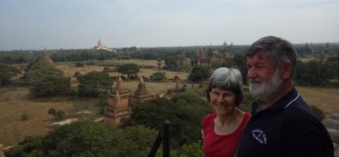 Trevor and Carolyn Monson with Buddist temples and shrines in the background – Bagan, Myanmar