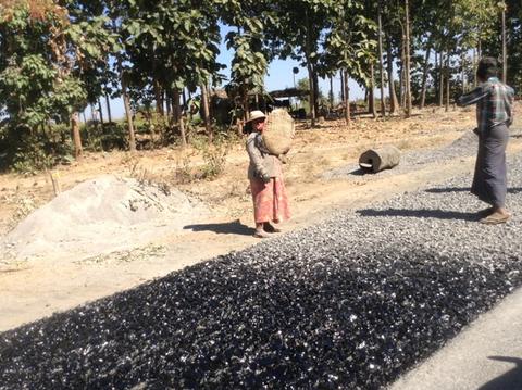 Bitumen is laid over the rocks