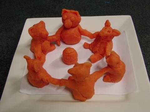 Winnie-the-Pooh picnic, with bee skep in the centre
