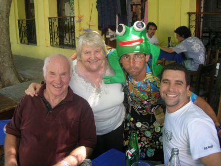 Bruce, Lynn Enrique and a waiter in Colonia