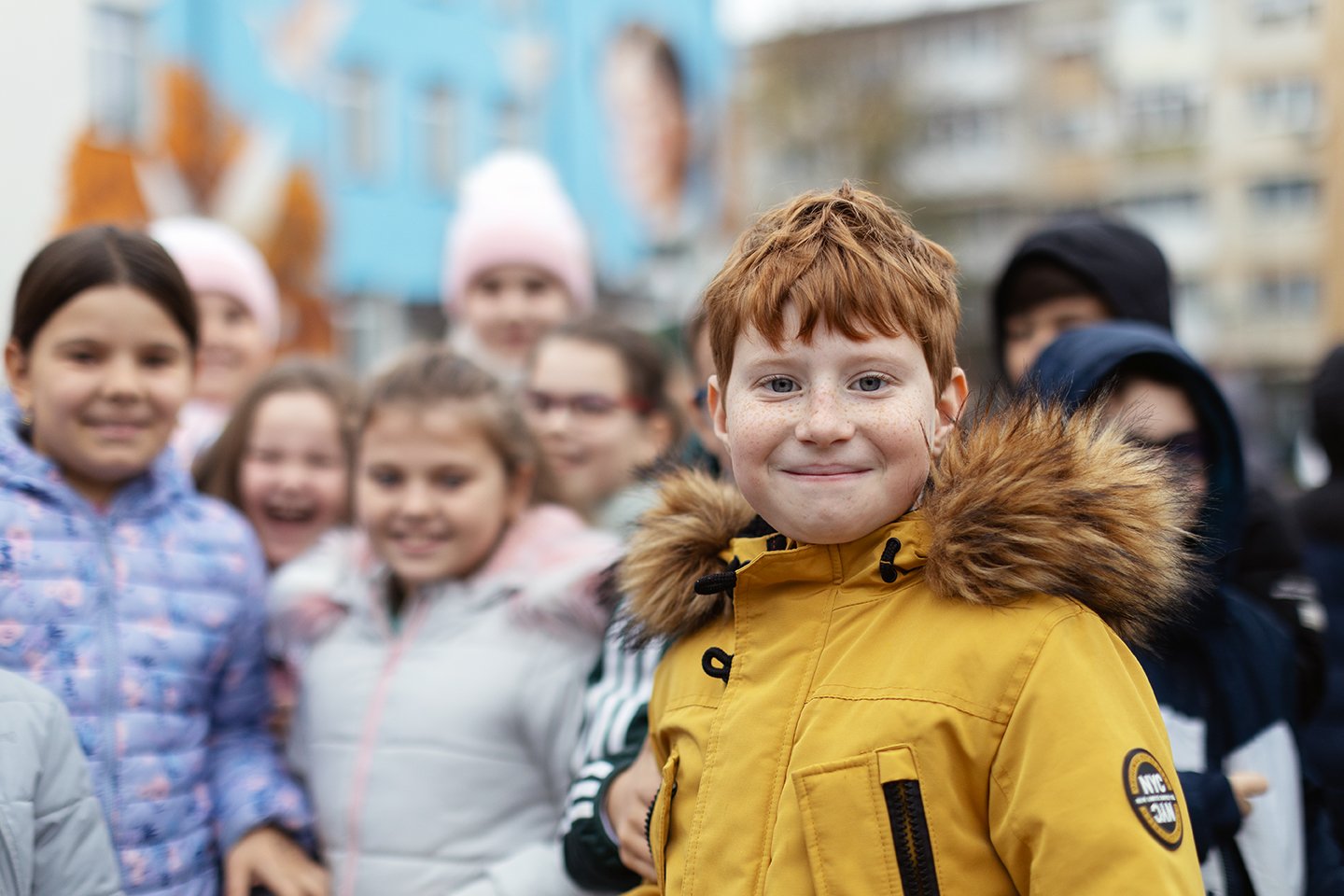 andy-bate-reportage-romania-ebrd-smiling-boy-playground-portrait-01.jpg