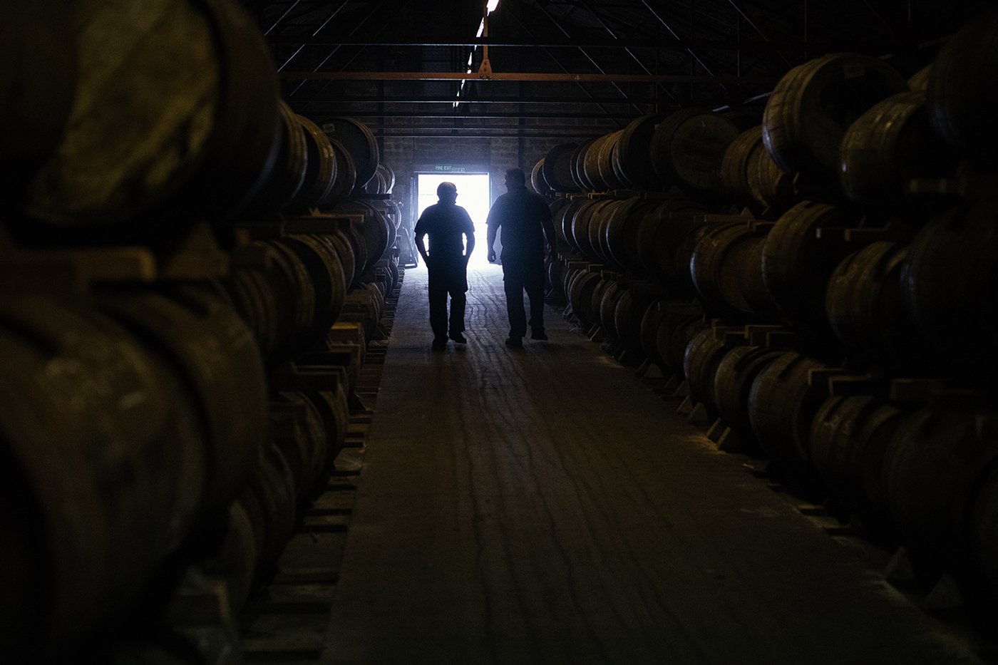 fettercairn-distillery-two-men-walking-dunnage-warehouse-17.jpg