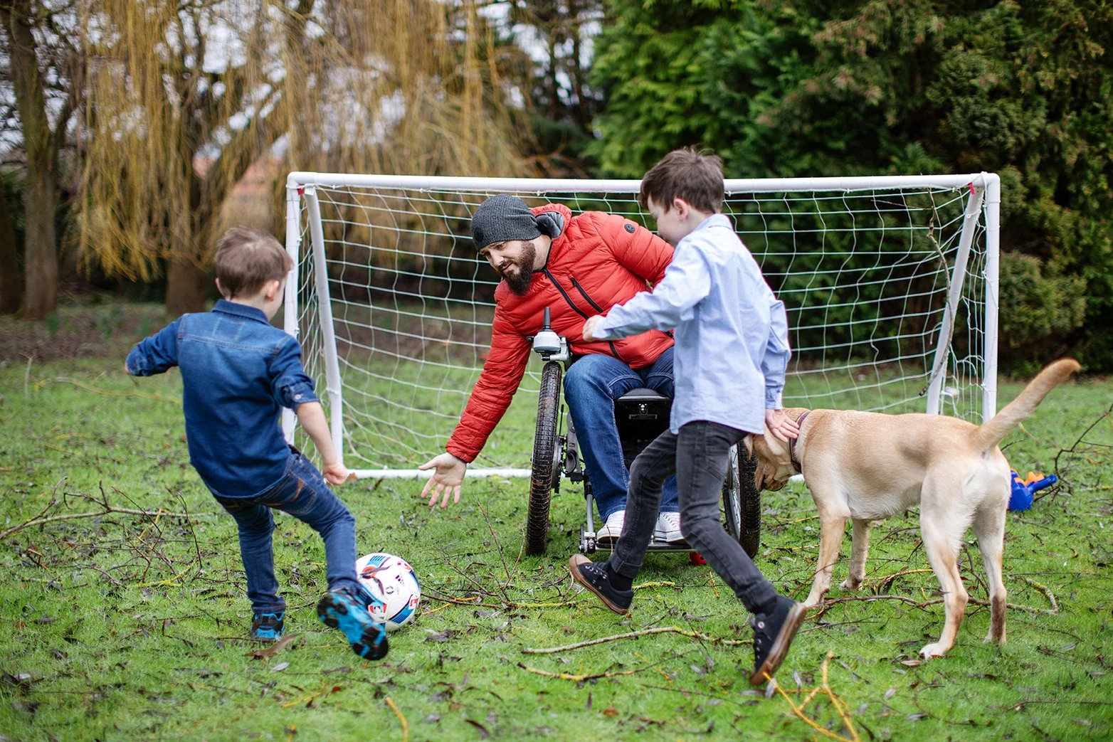andy-bate-veteran-wheelchair-football-children-dog-garden.jpg