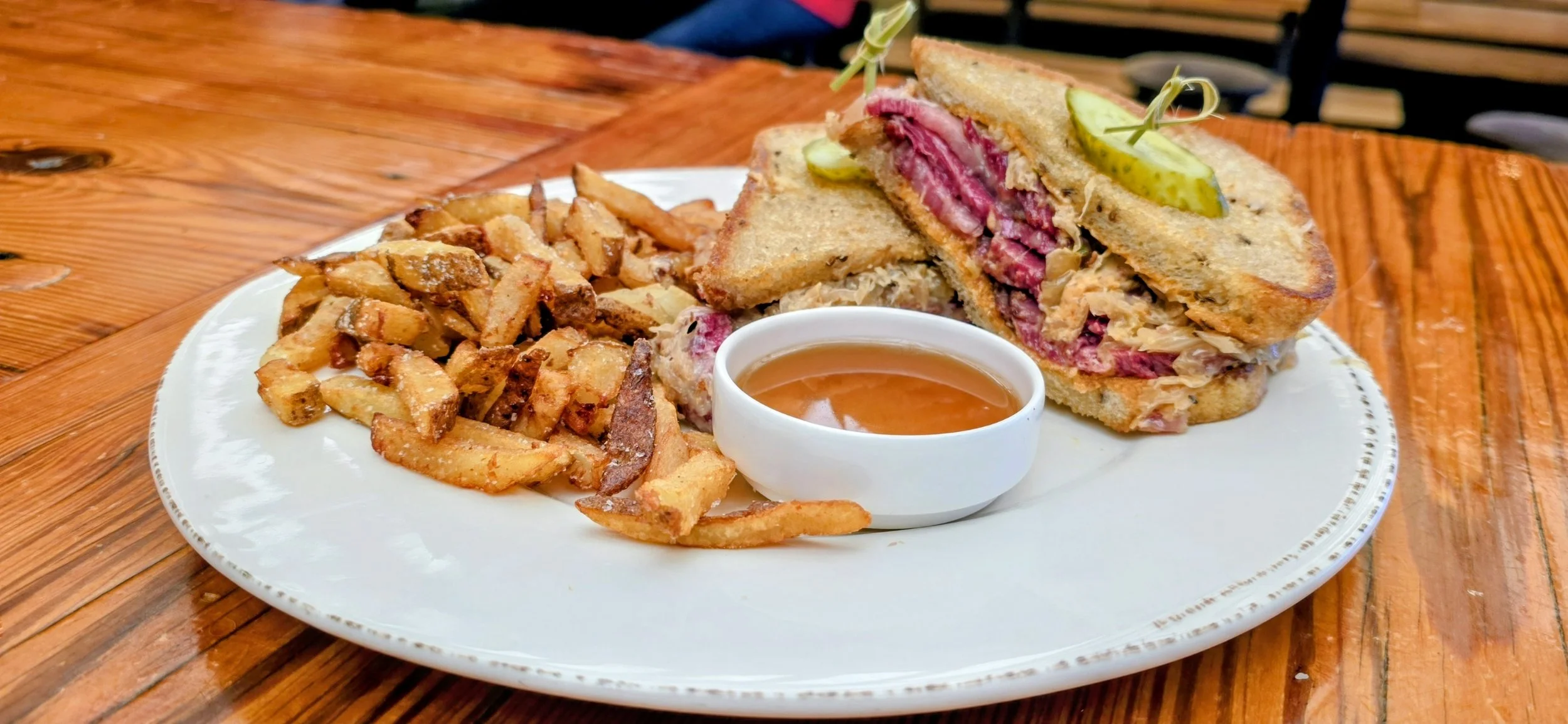 Smoked duck rueben on toasted jewish rye bread.