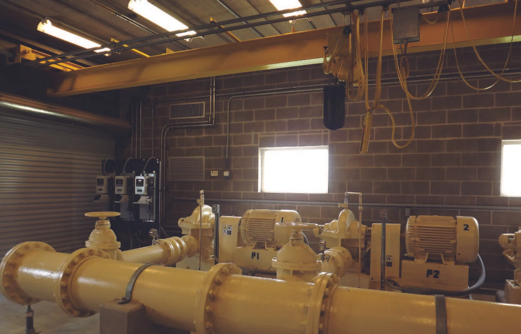 Replacement of problematic peristaltic pump system with special liquid vacuum feeder system for bleach, liquid ammonium sulfate (LAS), and polyphosphate feeds provided improved reliability for maintaining required minimum chlorine residual throughout booster-pumped distribution network.