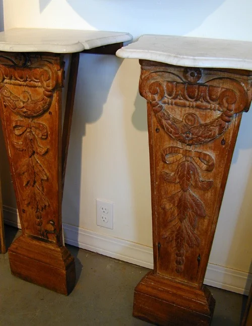Carved French wall tables with marble tops carefully restored.