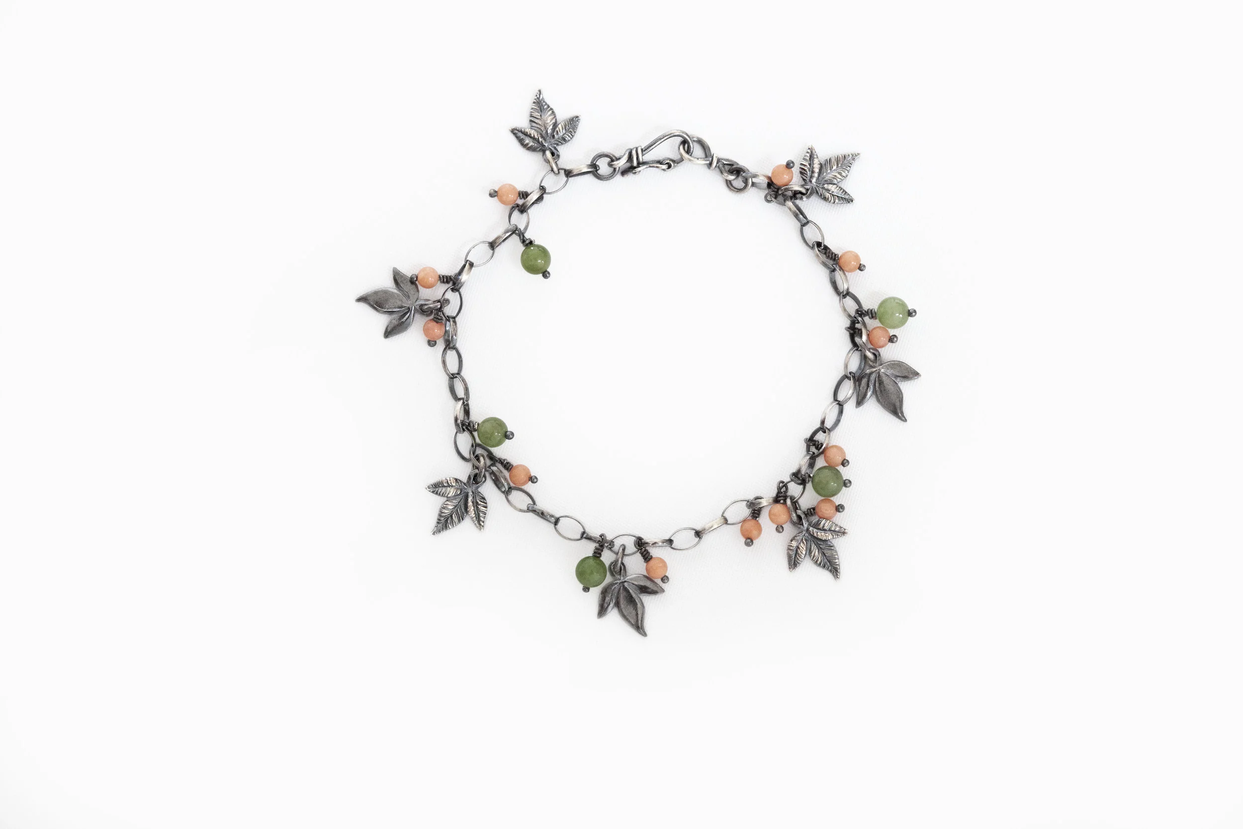 beadedleafcharm_round_silver.jpg