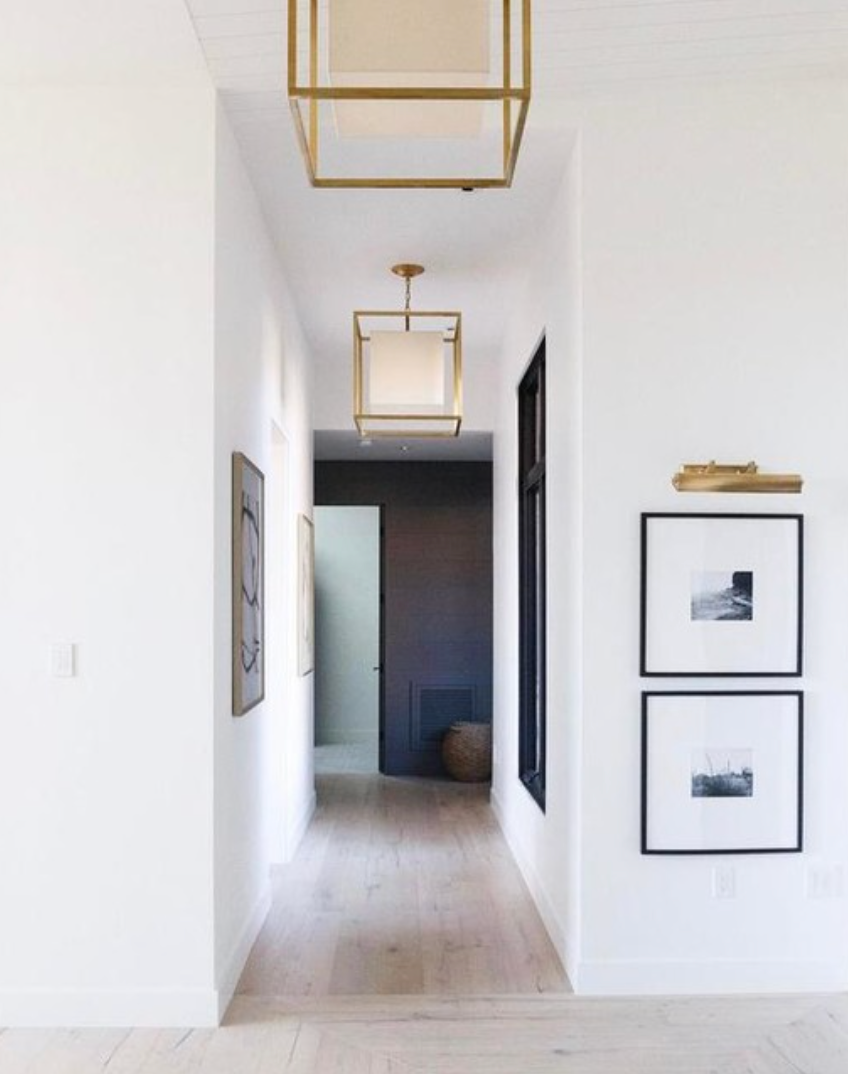 Finally, Saltbox Collective knows the difference between a hallway with style and a hallway in the lobby of Trump Tower. This judicious use of this sexy metal can make a bold statement without looking like the lobby at Trump Tower. 