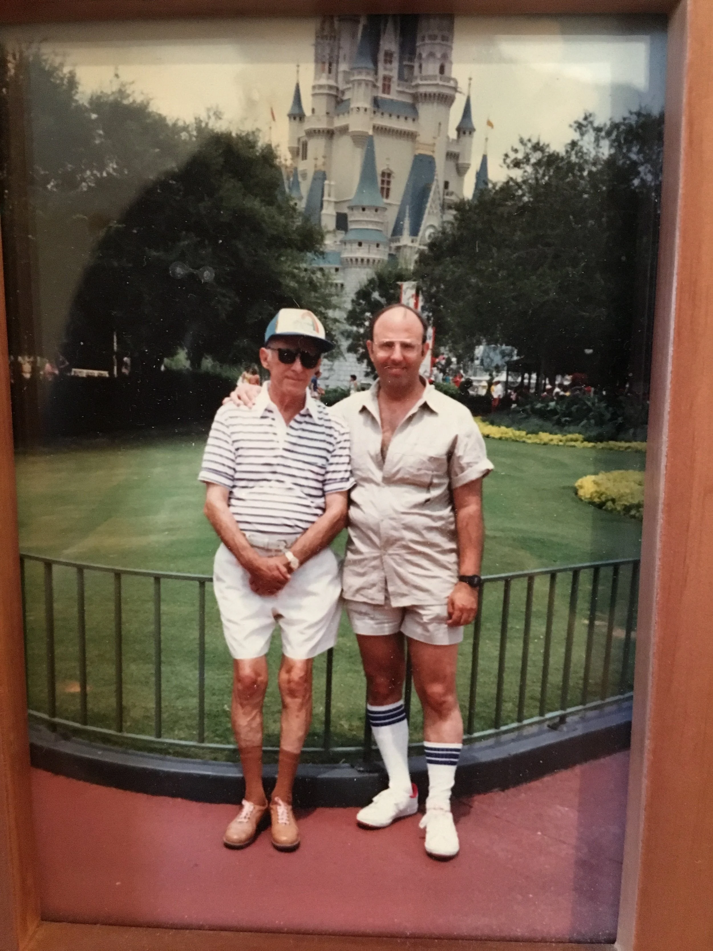 Grandpop and Pop in Disney World (and their knee socks!)