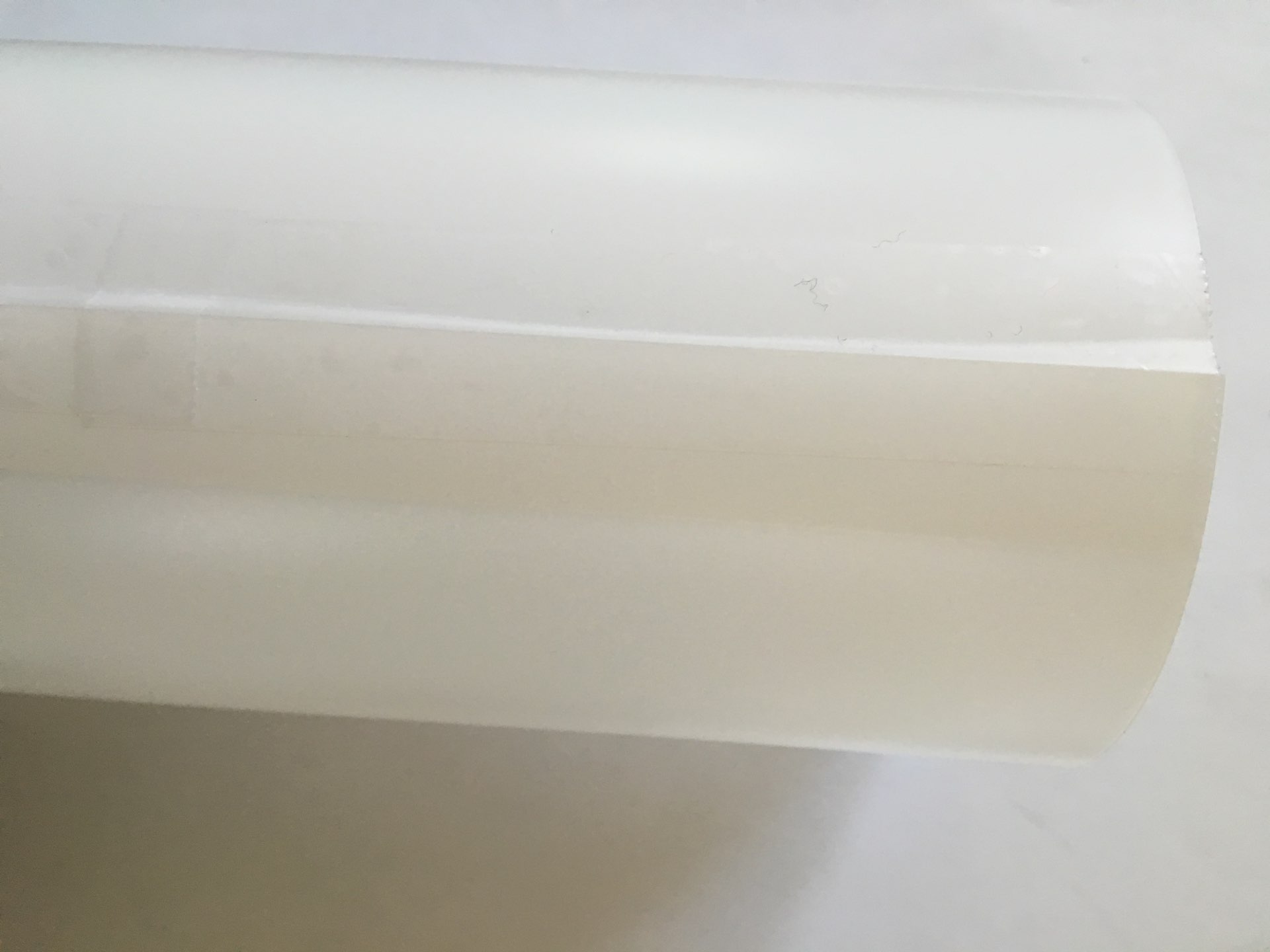 step - 4 Cut a stencil blank to measure 10" x 6.50". Apply a strip of invisible tape to one 6.50" edge. Overlap that edge .50" with the other and press the tape to secure the two edges and form a cylinder.