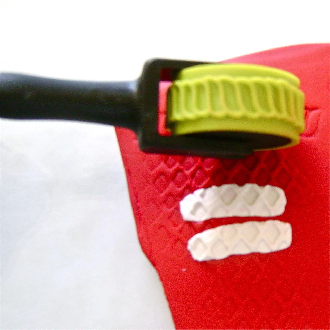 step 4 - Remove the texture sheet. Roll across the cuff with a texture wheel.