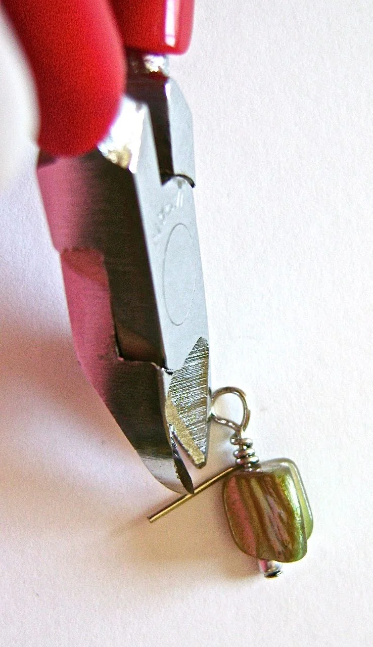 step 10 - Use wire cutters to snip off the tail as close to the wrap as possible.