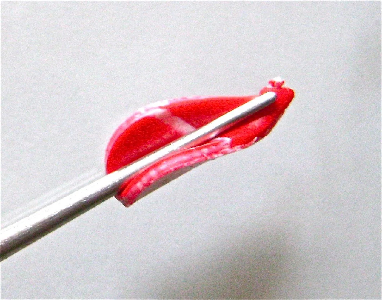 step 9 - Curl each petal loosely around the Etch n” Pearl tool to shape it. 