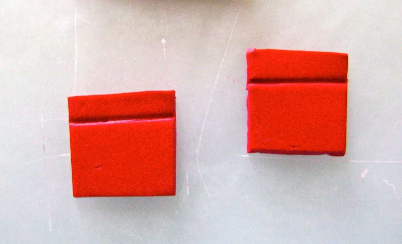 step 4 - Cut two squares .75” in size. Use an Etch ‘n Pearl tool to create a hem detail onthe edges.