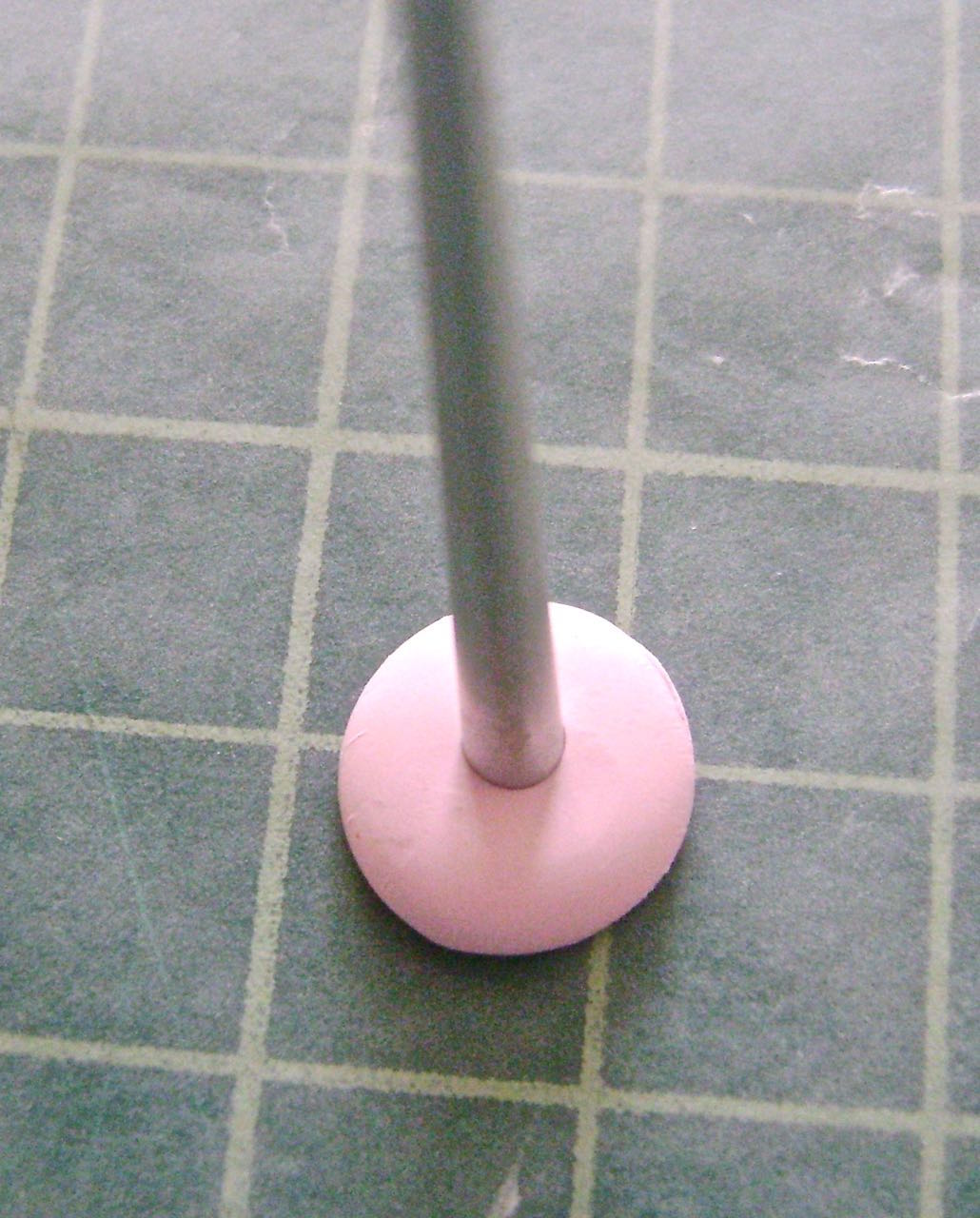 step 9 - Make a depression in the base of the circles with the end of the Etch n’ Pearl tool. 