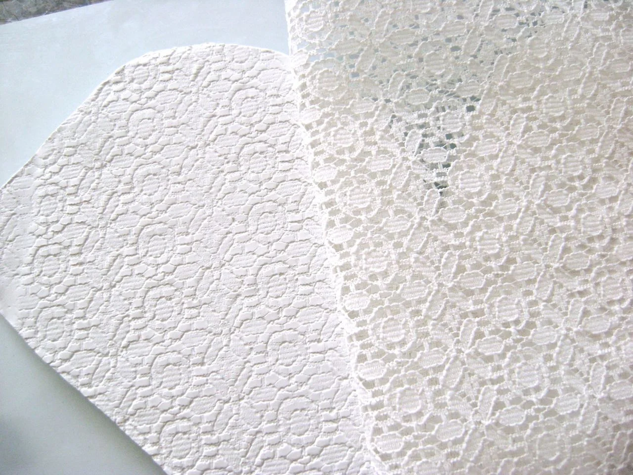 step 9 - Place a piece of lace over the clay. Roll across the surface with an acrylic roller to emboss the clay with the lace design. Carefully peel away the lace.