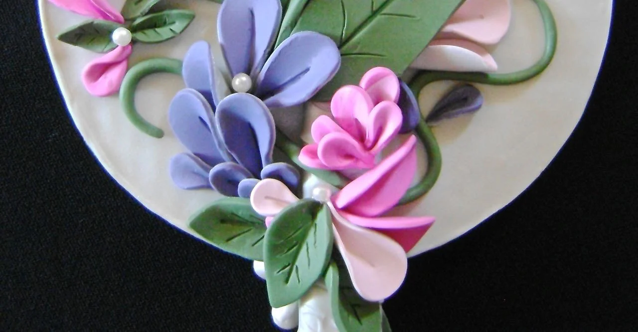 step 16 - Glue pearls to the flowers to suit your taste. 