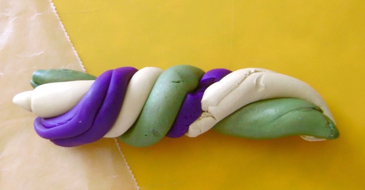 step 2 - Twist the rolls together.