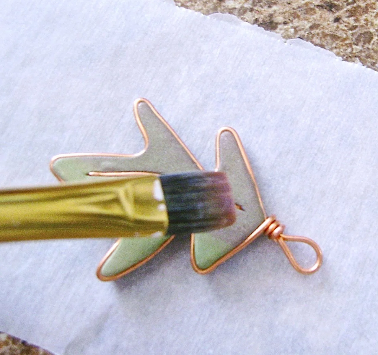 step 9 - Using a brush, apply a coat of Diamond Glaze. Allow to dry before handling.