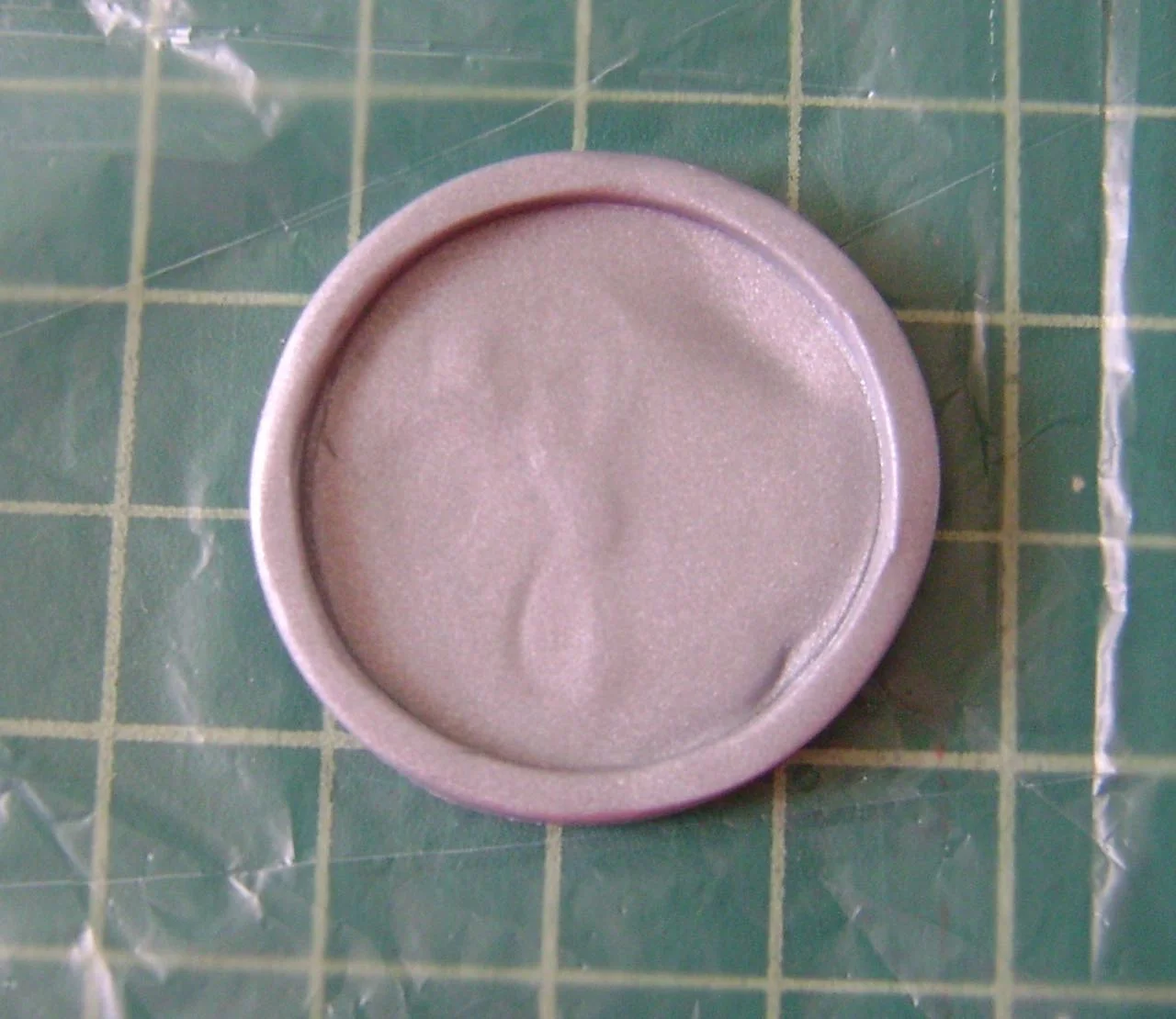 step 3 - Flex the mold to release the clay.
