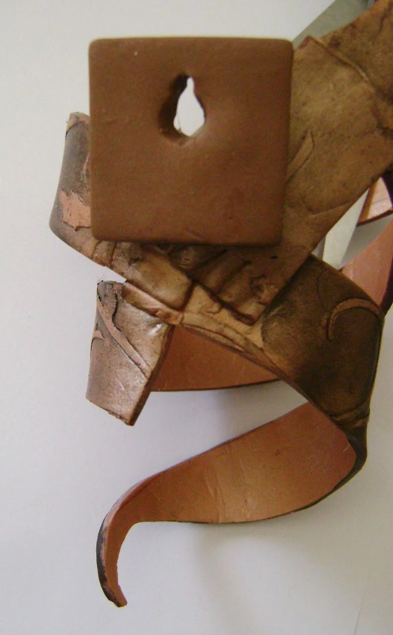 step 8 - Glue the hanger onto the back of the sconce using Aleene’s Turbo tacky glue and allow it to dry. 