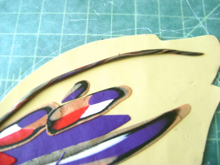 step 10 - Drape the tubes along the upper edge of the wings and upper edge of the bottom wings.