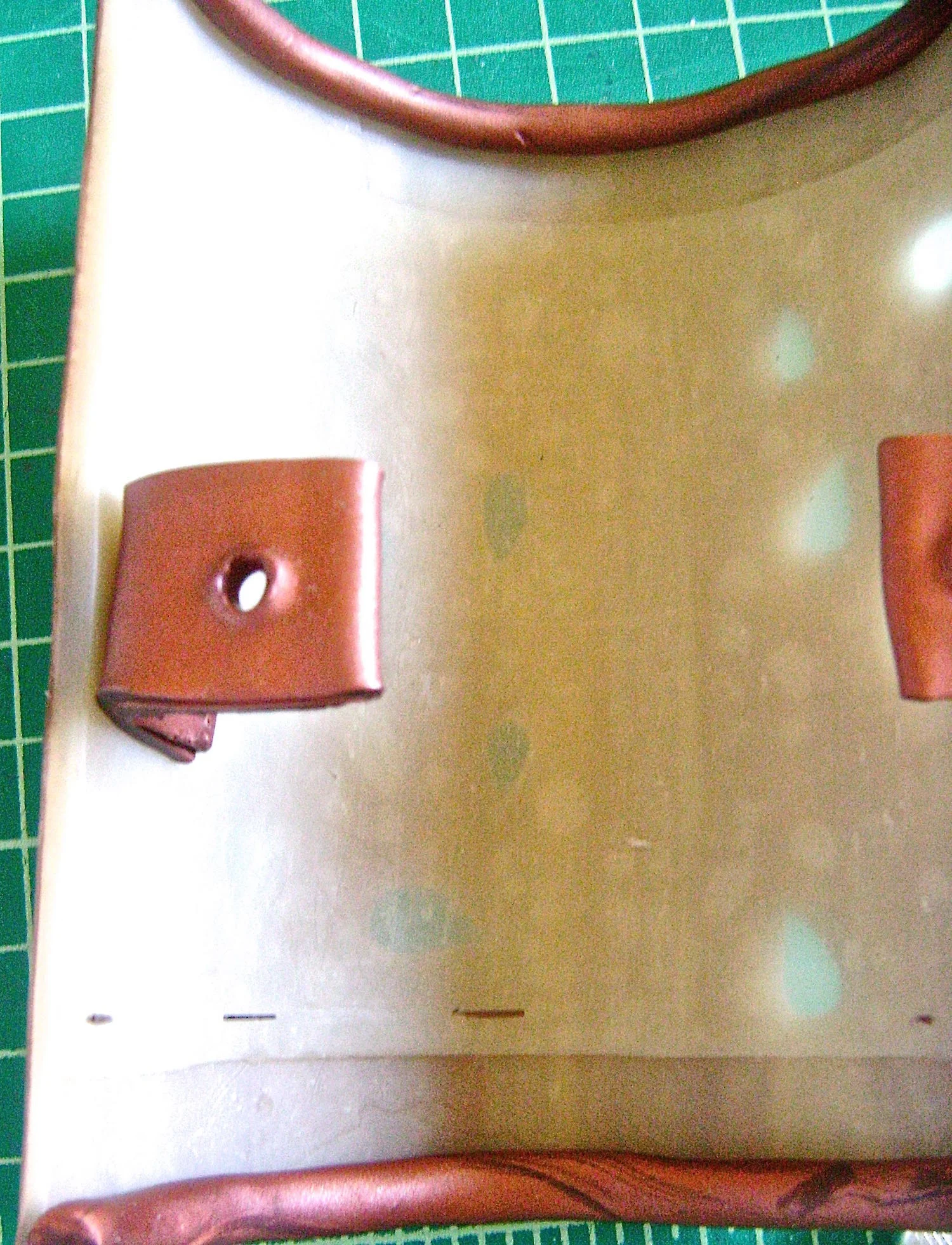 step 13 - Make marks on the inside of the sconce one inch from the top. The marks will guide your shelf placement. The shelf will hold the battery pack close to the top of the sconce.