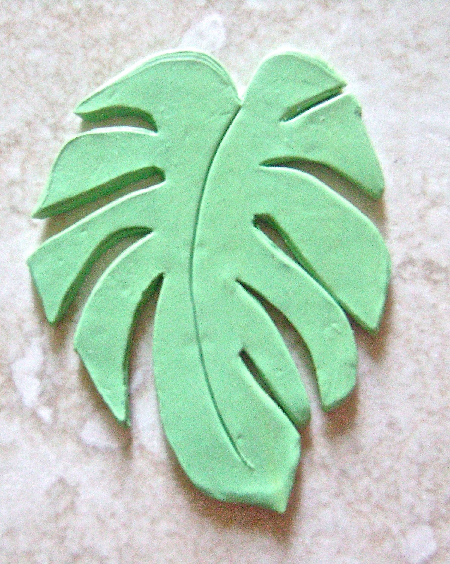 step 9 - Keep in mind you can also use a craft knife to cut around the raised image to create a separate piece to be added to your project.