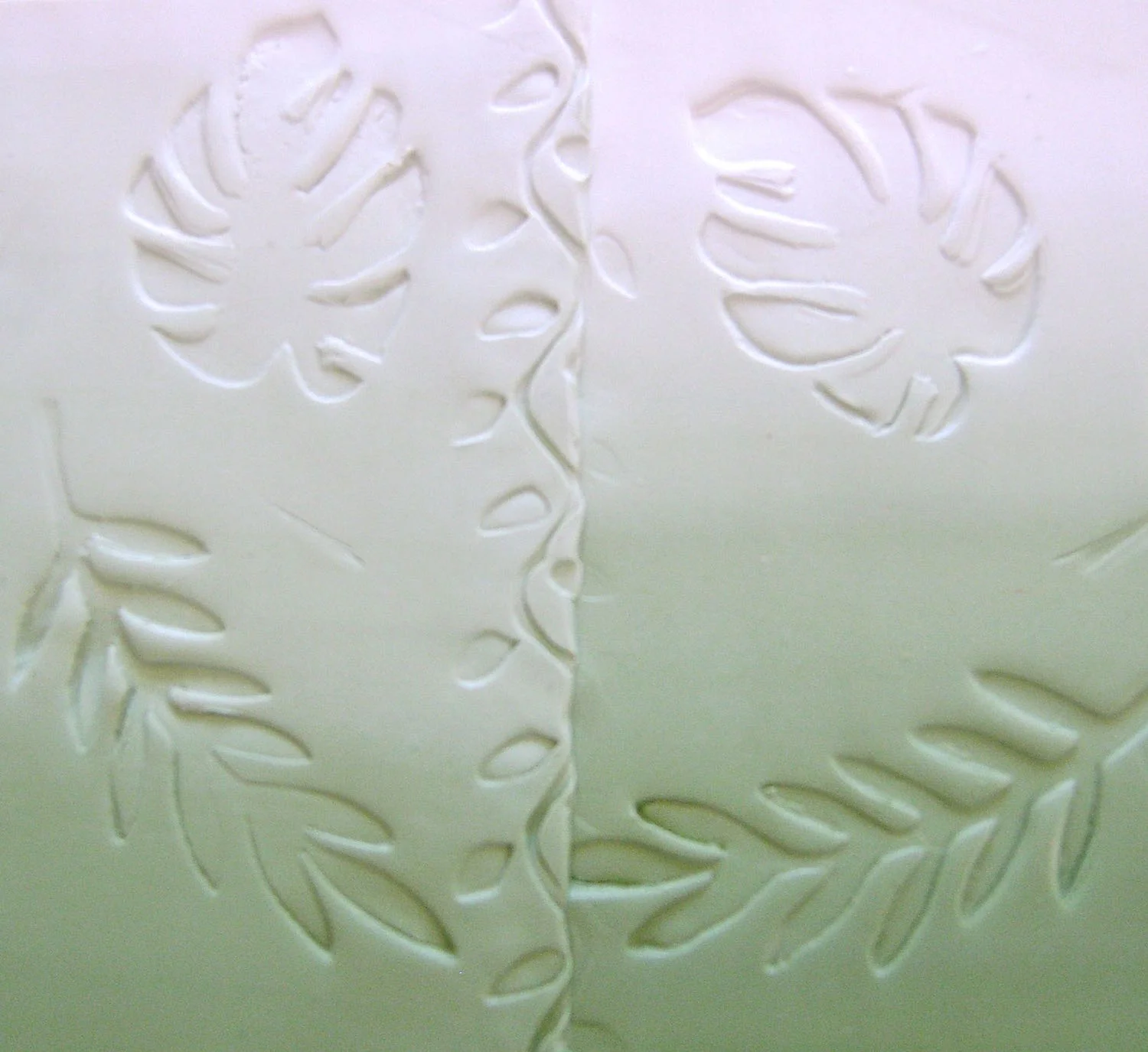 step 9 - Make leaf impressions on the joined panel seam with a leaf pattern texture wheel.
