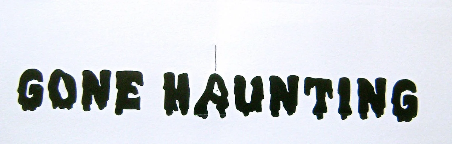 step 4 - Print and cut out the “Gone Haunting” message on card stock. Mark the center of the message.