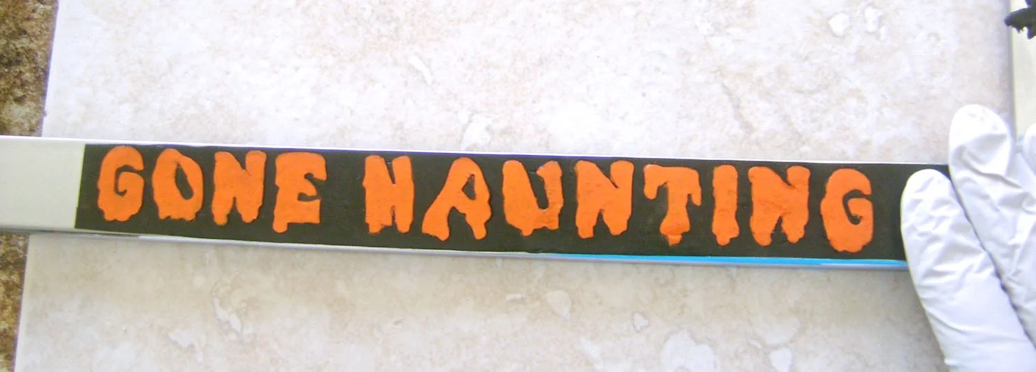 step 12 - Use E6000 to glue the message to the frame close to the right edge. It should not be centered on the frame which will allow room for tree roots on the left side.