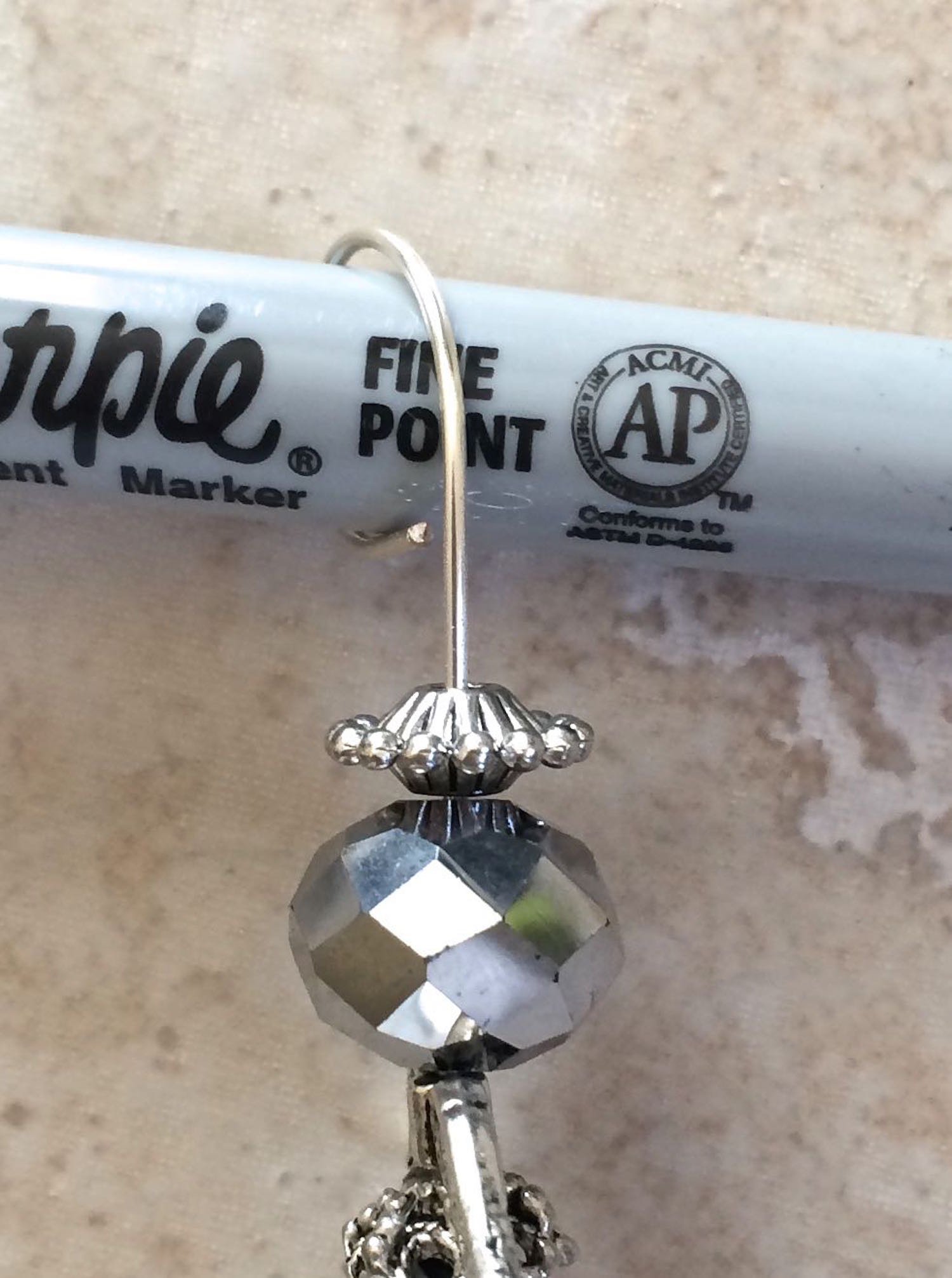 step 10 - Wrap the wire around a Sharpie marker to create a circle for the halo.