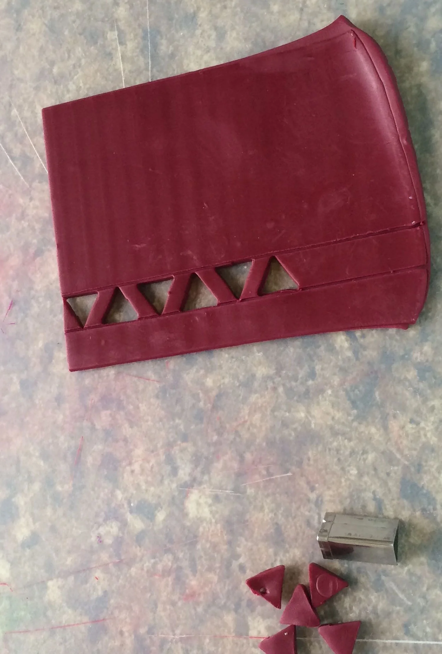 Another way to create clay stencils is with clay cutters. Intricate patterns can be formed by combining various cutter shapes or using cutting blades and other tools.