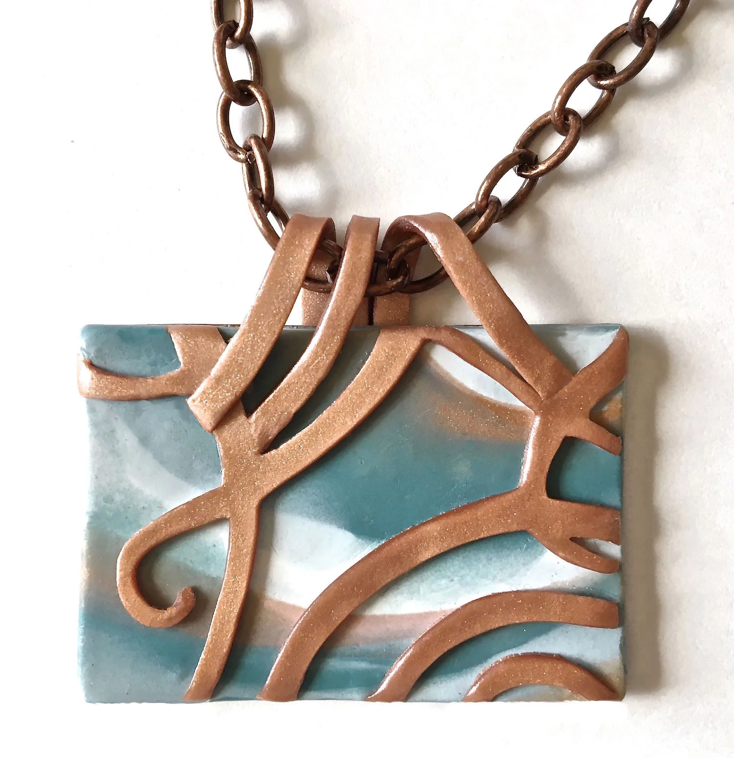 pendant measures 2" x 1.50"