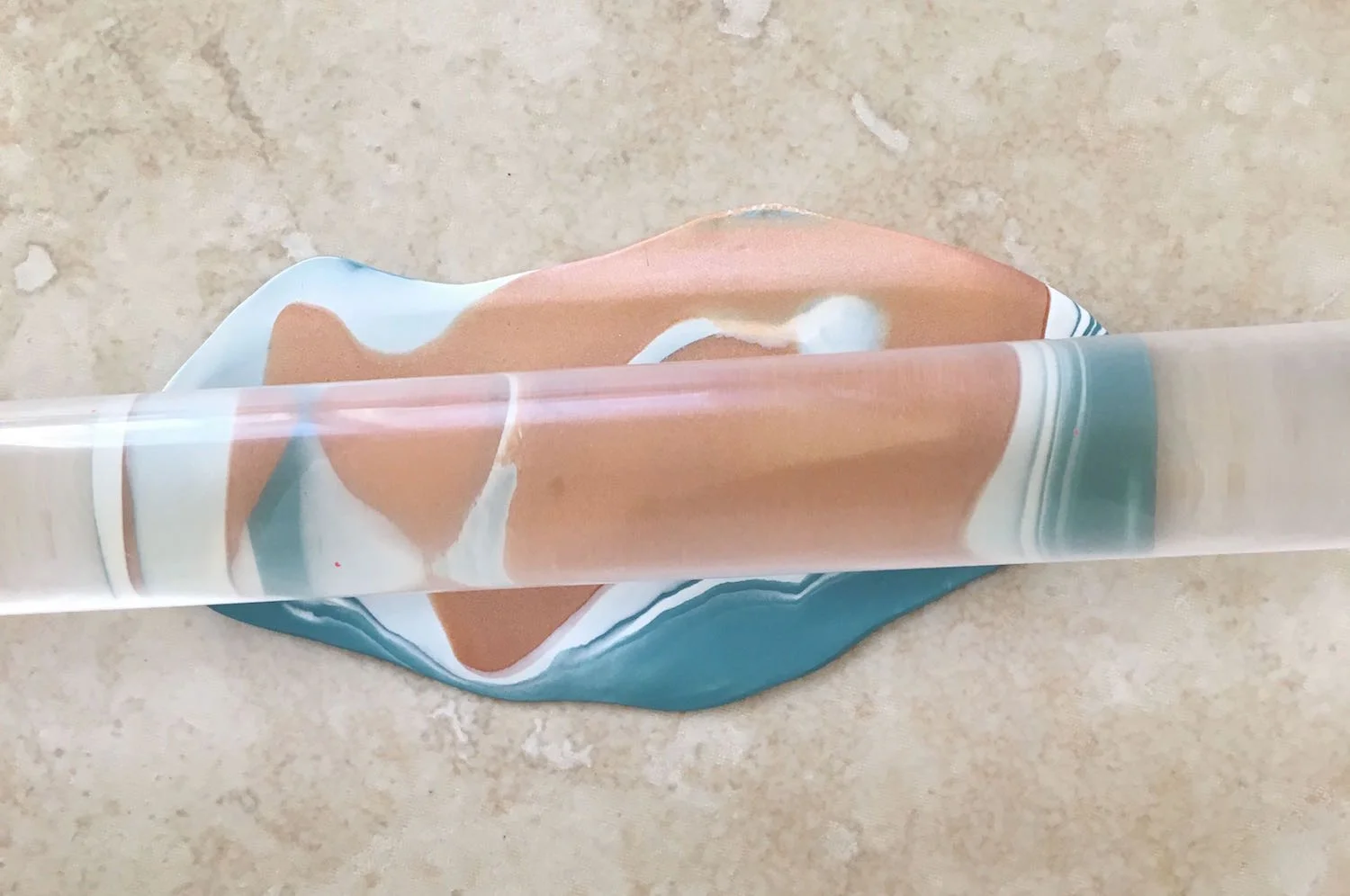 step 5 - Use the acrylic roller to flatten the tube.