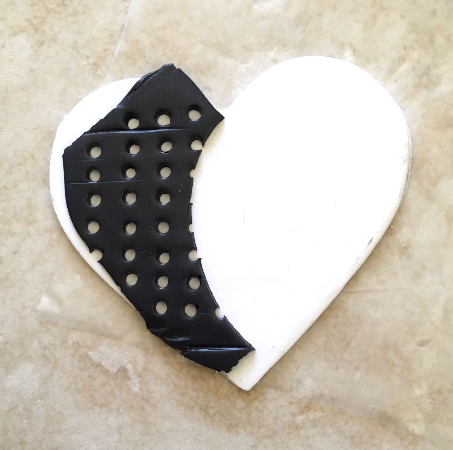 step 5 - Place the blue clay on the white heart.