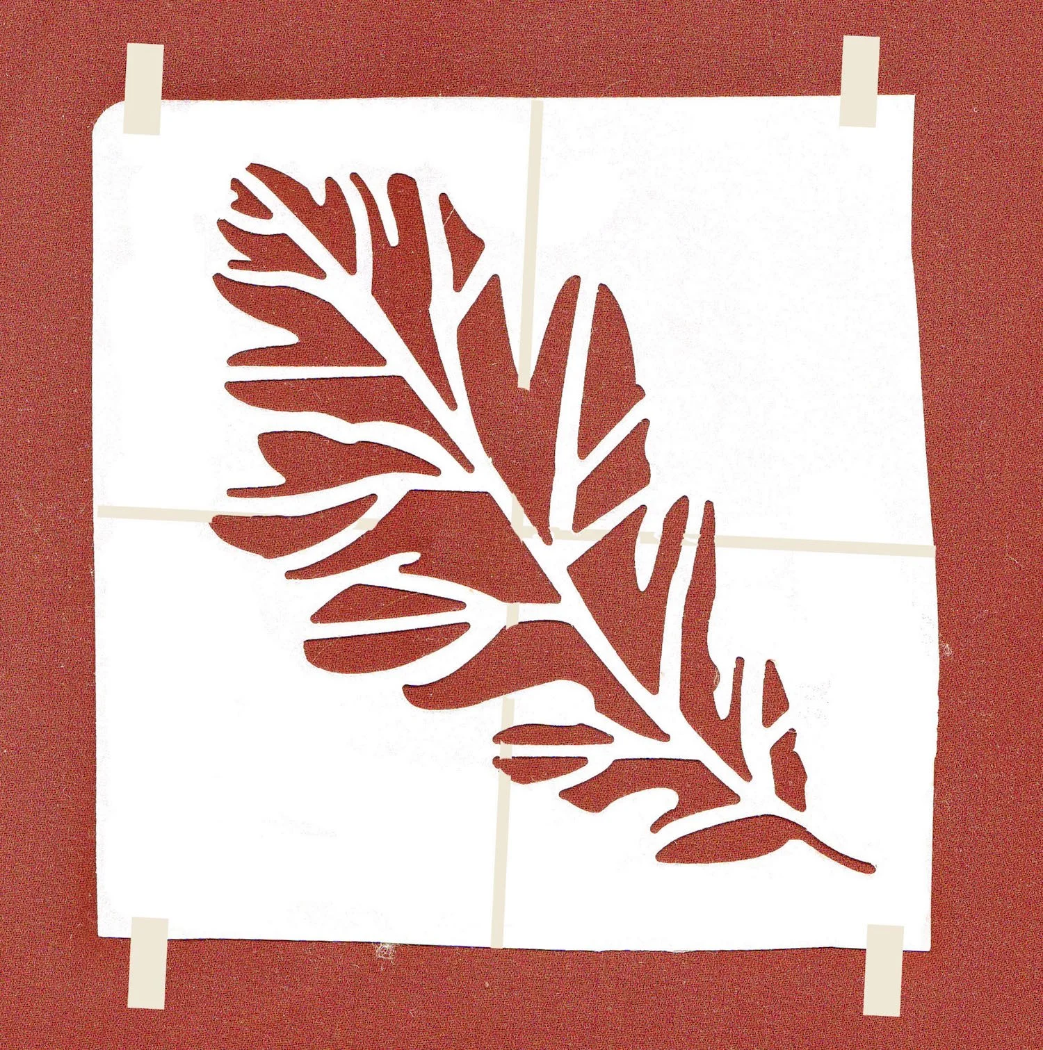 step 9 - Rust Canvas Painting Directions Cover the canvas entirely with the rust paint. When it dries, center your personally crafted leaf stencil on the surface. With painter’s tape secure the outer edges in place.